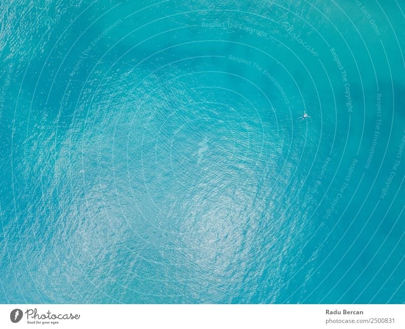 Aerial View Of Man Lost In The Middle Of The Ocean Aircraft Vantage point Swimming Above Vacation & Travel Summer Water Tropical Blue Beautiful Happy Joy