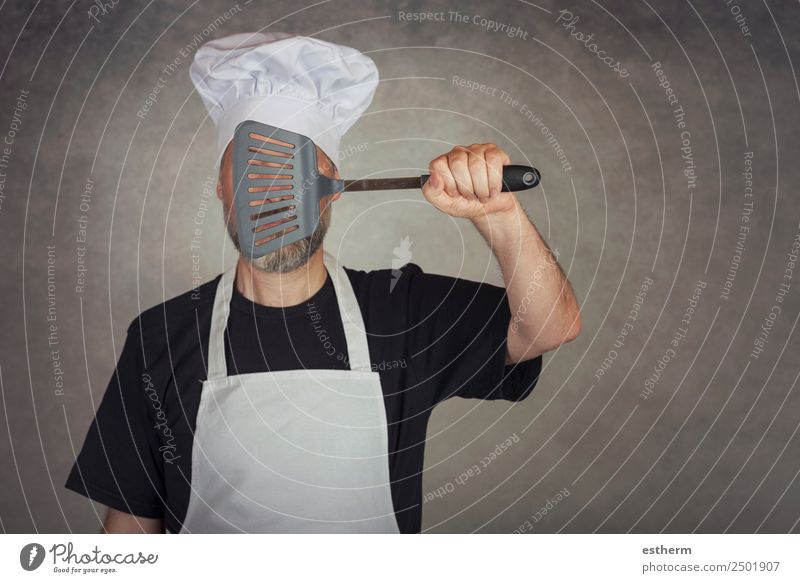 man holding spatula in his eyes Nutrition Dinner Diet Cutlery Lifestyle Kitchen Restaurant Gastronomy Human being Masculine Man Adults 1 30 - 45 years Hat