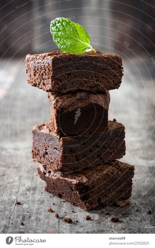 Chocolate brownie pieces on wood Brown Confectionary Sweet Candy Dessert Baked goods Cake nut walnuts Food Healthy Eating Food photograph Snack Delicious Baking