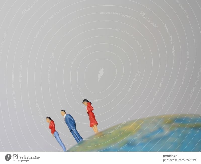 Three people (figures) stand on a globe. Citizens of the earth. population. Dominance Human being Woman Adults Man 3 Cliche Globe Earth Stand Above Suit