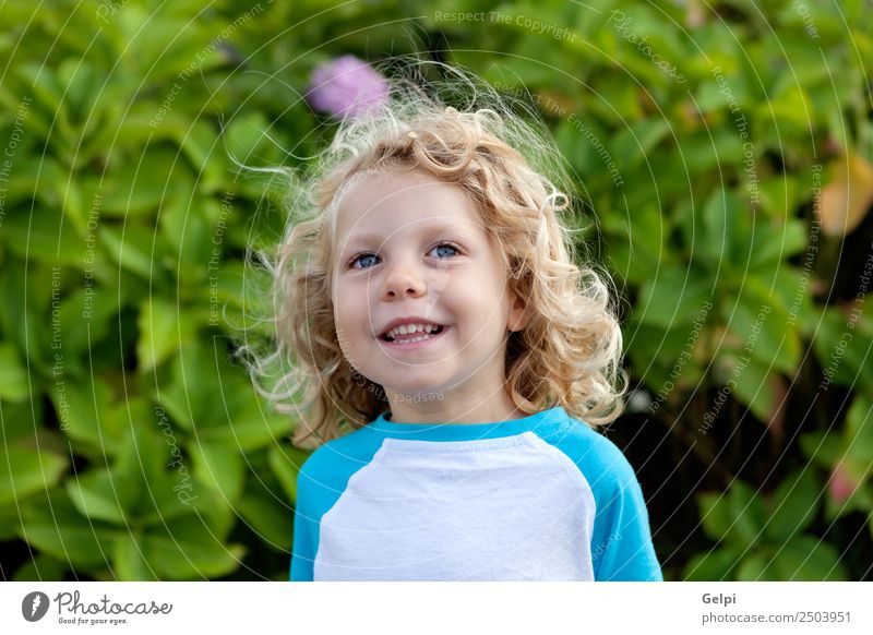 Small child with long blond hair Happy Beautiful Face Summer Child Human being Baby Boy (child) Man Adults Infancy Environment Nature Plant Blonde Smiling Sit