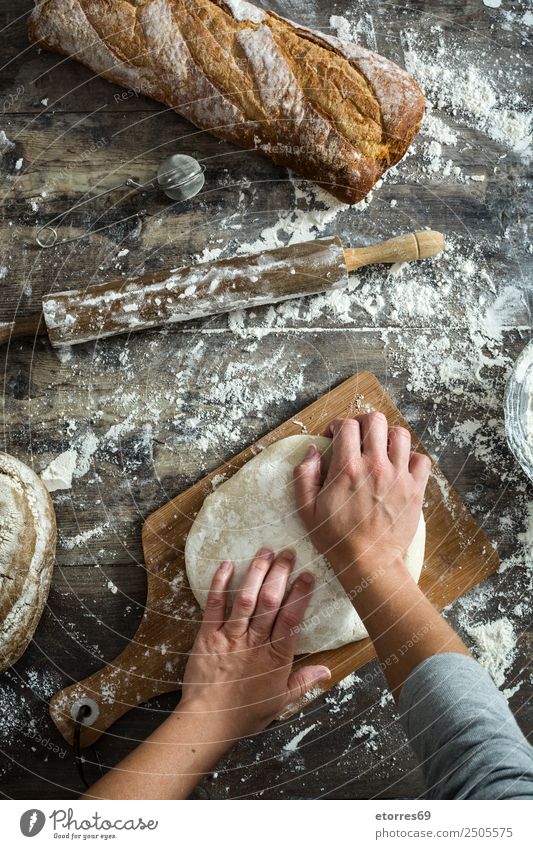 woman kneading artisan bread on wooden table Food Healthy Eating Food photograph Bread Nutrition Breakfast Lunch Dinner Table Kitchen Feminine Woman Adults Hand