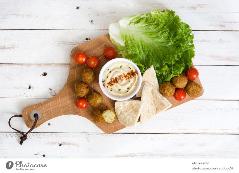 Falafel and vegetables on white wooden background Food Healthy Eating Food photograph Vegetable Grain Asian Food Bowl Fresh Brown falafel Chickpeas Tomato