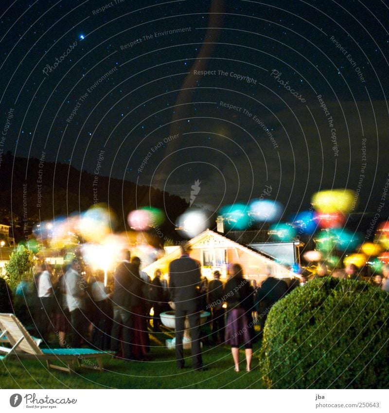before departure Night life Event Wedding Human being Masculine Group Night sky Stars Beautiful weather Bushes Thun Roof Dress Suit Balloon Movement Flying