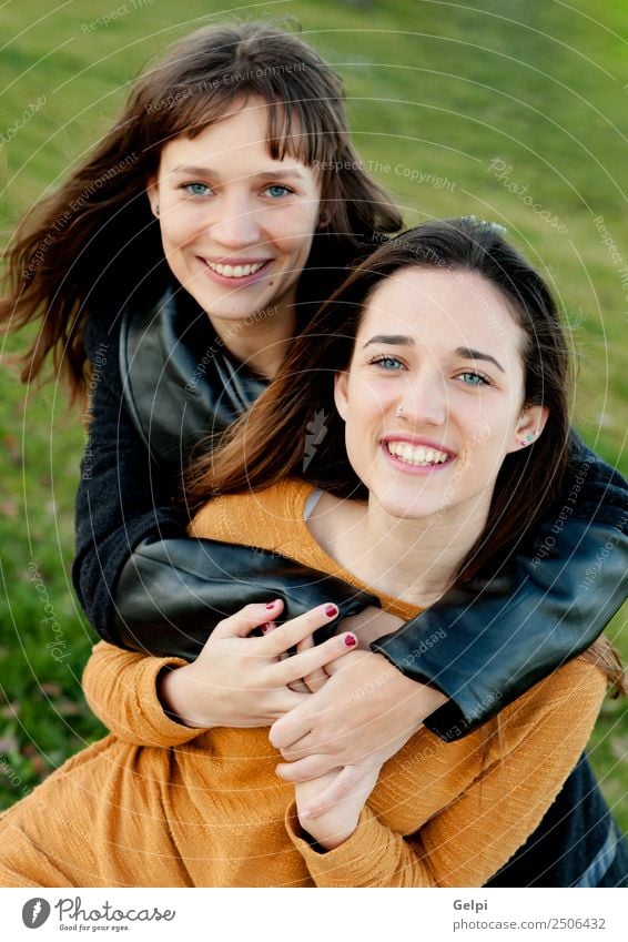 Outdoor portrait of two happy sisters Lifestyle Joy Happy Beautiful Human being Woman Adults Sister Family & Relations Friendship Youth (Young adults) Teeth