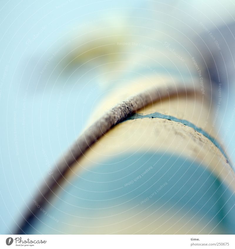 rope team Flagpole String Blue Yellow Green fixed focal length Striped Mast Whorl Tall Blur Colour photo Subdued colour Exterior shot Close-up Detail Deserted