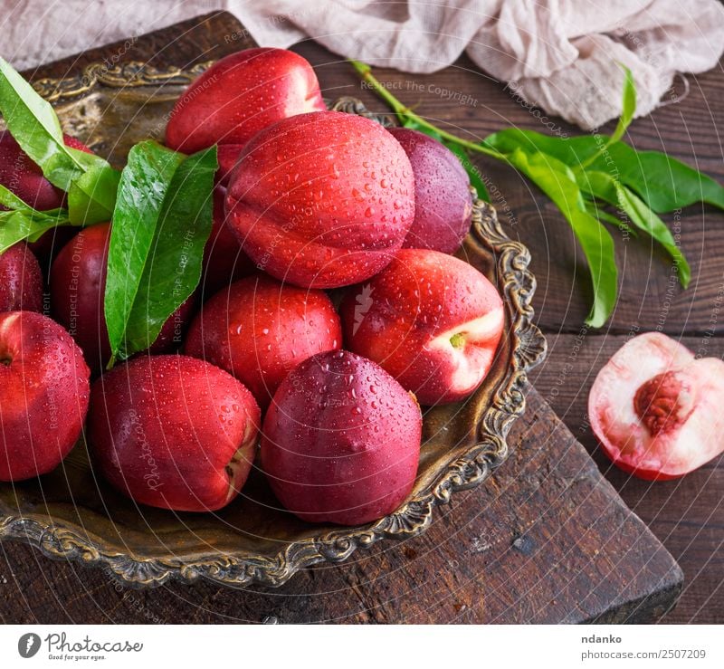 red ripe peaches nectarine Fruit Dessert Nutrition Summer Table Wood Eating Fresh Juicy Brown Red Nectarine background food healthy sweet Raw Mature Peach whole