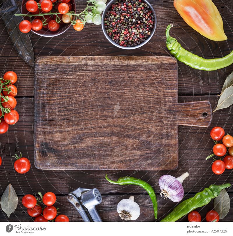 empty kitchen cutting board Vegetable Herbs and spices Chopping board Wood Eating Fresh Above Brown Yellow Red Tradition food Tomato Cherry Mature round