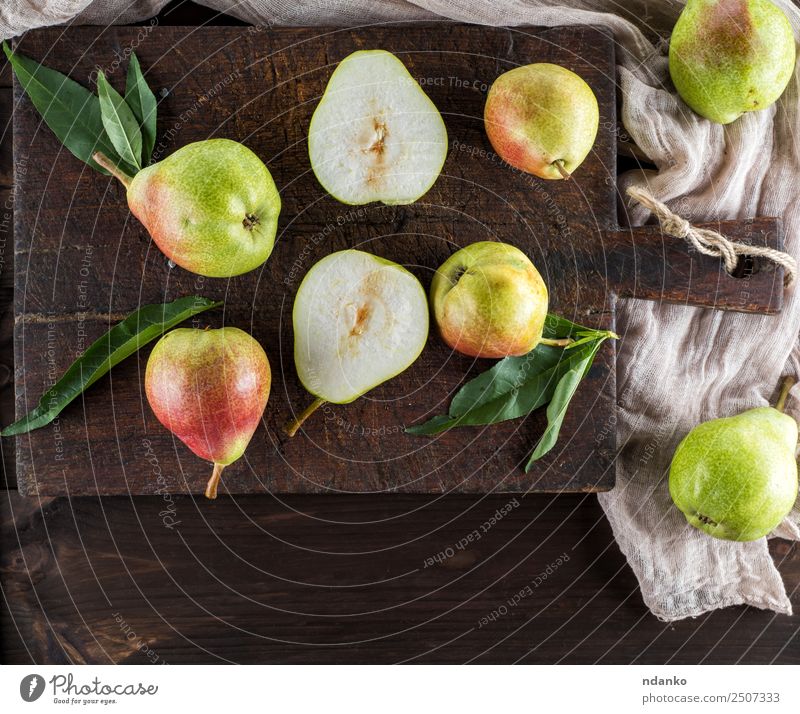 ripe green pears Fruit Nutrition Vegetarian diet Diet Table Nature Leaf Wood Old Eating Fresh Natural Juicy Yellow Green Pear background Rustic food healthy