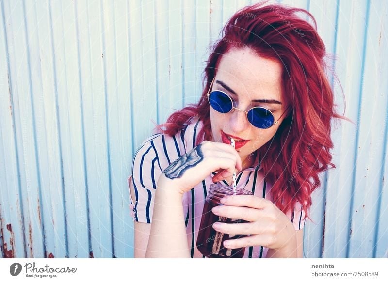 Young redhead woman drinking a beverage Beverage Drinking Cold drink Juice Tea Straw Lifestyle Style Beautiful Hair and hairstyles Human being Feminine
