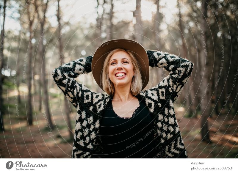 Happy smiling woman with hat in the forest Lifestyle Joy Beautiful Leisure and hobbies Vacation & Travel Adventure Freedom Human being Feminine Young woman