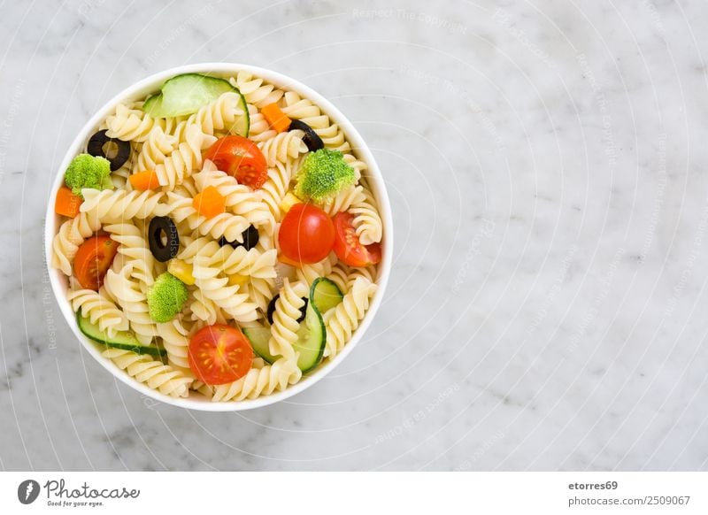 Pasta salad Food Vegetable Lettuce Salad Dough Baked goods Nutrition Bowl Healthy Summer Fresh Good Green Red Tomato Broccoli Olive Cucumber Marble Copy Space