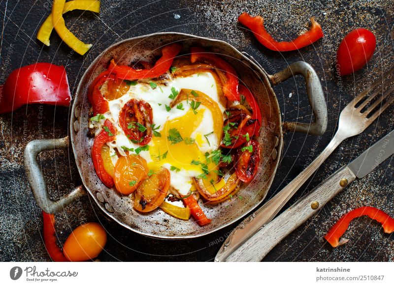 Fried egg with a bell pepper and tomatoes Vegetable Breakfast Pan Table Fresh Bright Yellow Red Cholesterol Cooking fat food Frying Fried egg sunny-side up Meal
