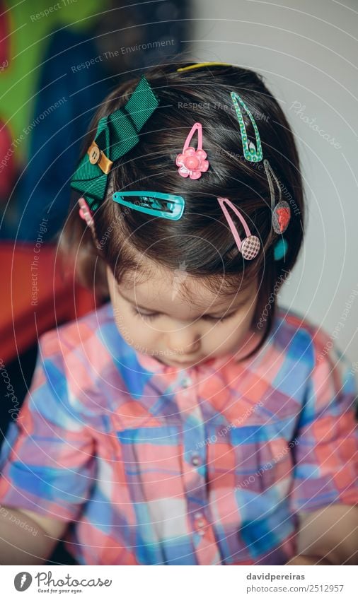 Baby girl head with a lot of hair clips Lifestyle Joy Happy Beautiful Hair and hairstyles Playing House (Residential Structure) Child Human being Toddler Woman