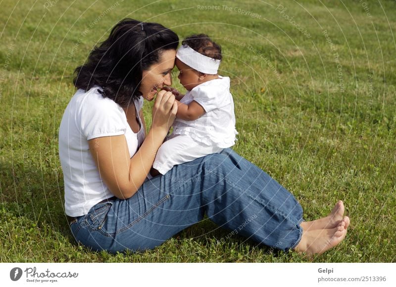 Mother playing with her daughter on the grass Joy Happy Beautiful Life Playing Child Human being Baby Toddler Woman Adults Parents Family & Relations Infancy