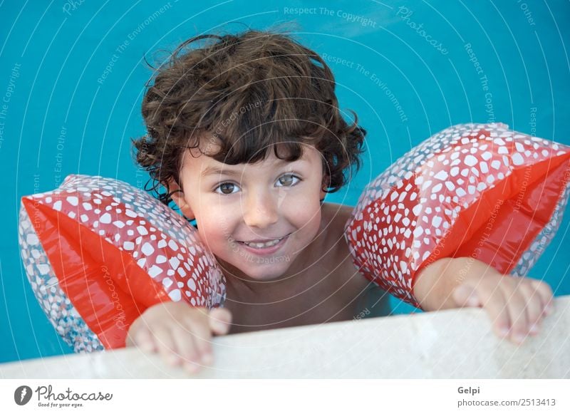 photo of an adorable boy learning to swim Beautiful Swimming pool Playing Vacation & Travel Summer Beach Ocean Child School Human being Baby Toddler Boy (child)