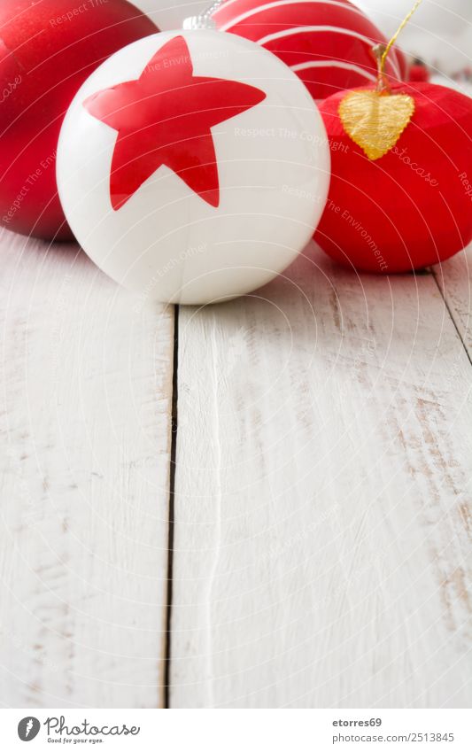 Christmas ornaments Christmas & Advent Ornament Sphere Round Red White Balloon Celebration of success Seasons Decoration Star (Symbol) Copy Space Wooden table