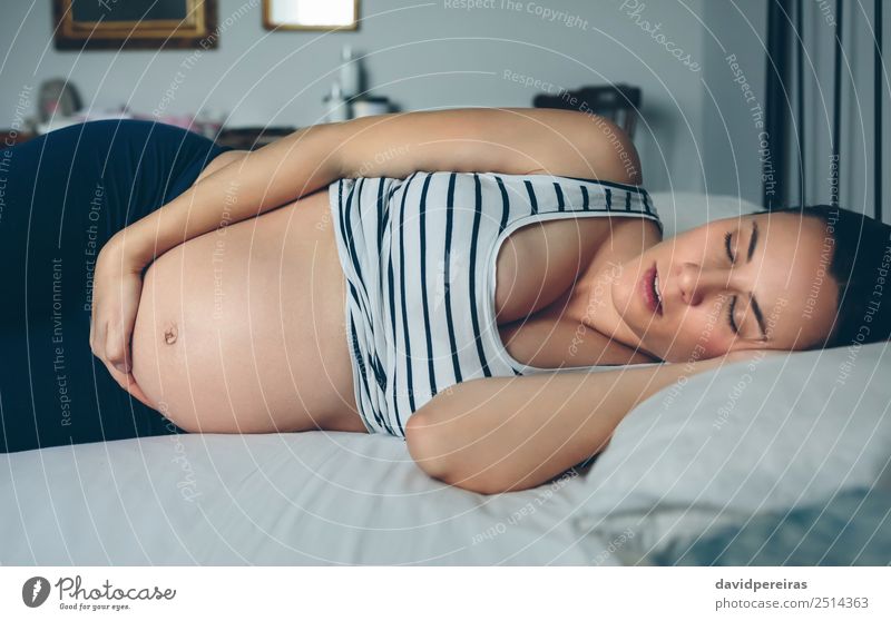 Pregnant woman sleeping in bed Lifestyle Beautiful Relaxation Bedroom Human being Baby Woman Adults Mother Family & Relations Sleep Authentic Naked Cute