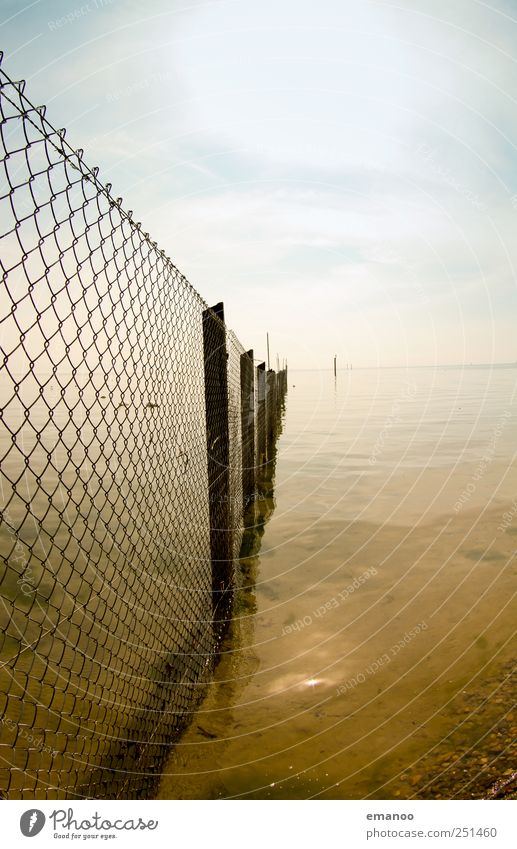 Water knows no boundaries Nature Landscape Air Sky Horizon Weather Waves Coast Lakeside Beach Wood Metal Free Blue Brown Border Fence Wire netting fence