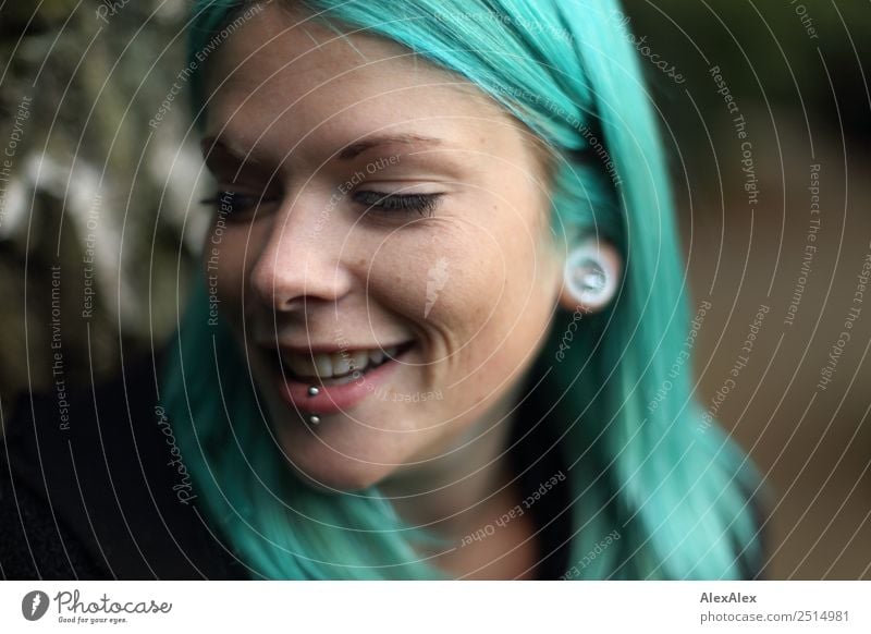 Young woman with turquoise hair and piercings smiles Style Exotic Beautiful Life Youth (Young adults) 18 - 30 years Adults Jewellery Piercing Long-haired Punk