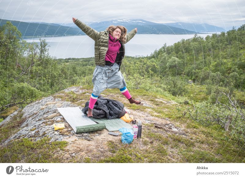 Young woman jumps cheerfully, tent camp, Scandinavia Well-being Contentment Vacation & Travel Adventure Far-off places Freedom Youth (Young adults) Life Nature