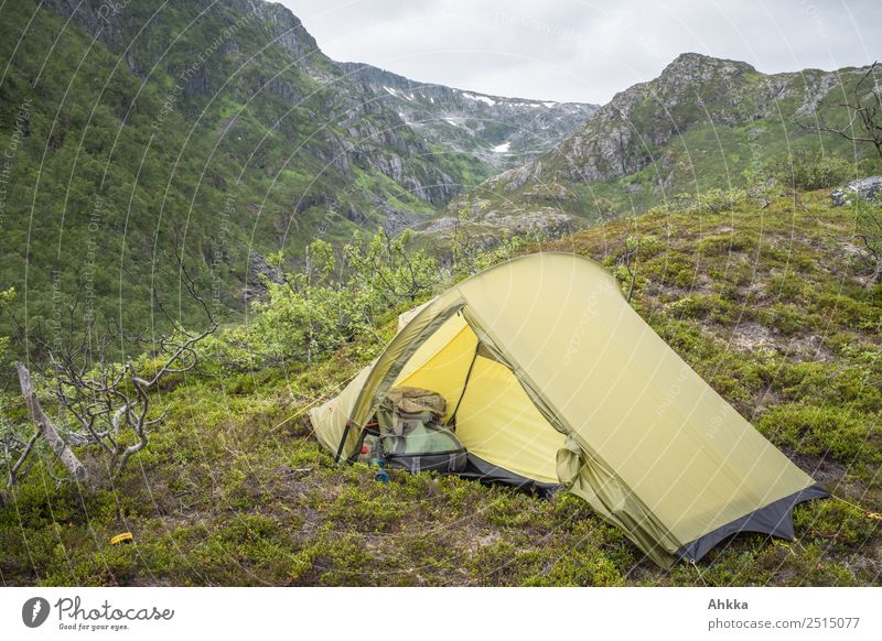 A green tent stands in the mountains Tent camp Green Mountain Open Adventure Safety Wild Norway Rough Protection Cozy Peaceful Freedom Nature Rock Landscape