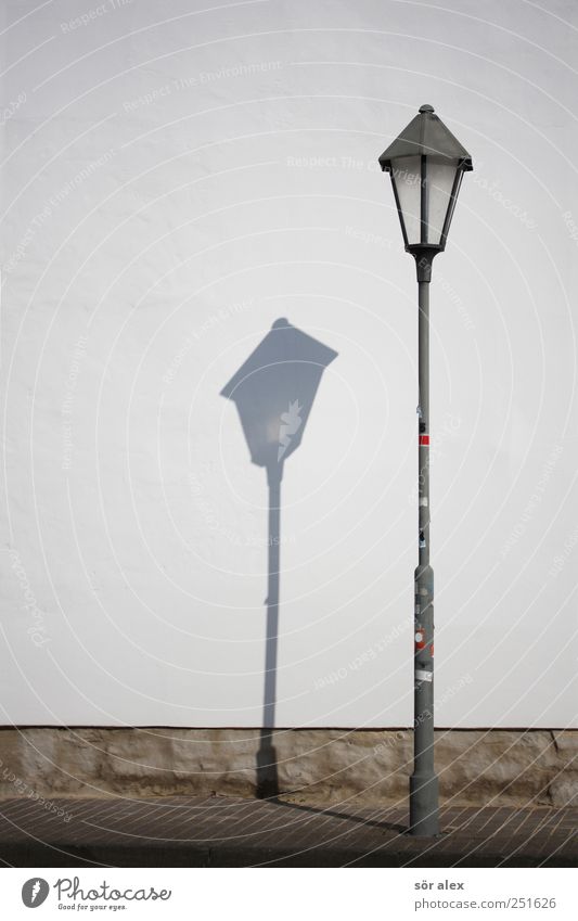 Light and shadow Small Town Manmade structures Sidewalk Street lighting Lamp post Wall (barrier) Wall (building) White Loneliness Forget Colour photo
