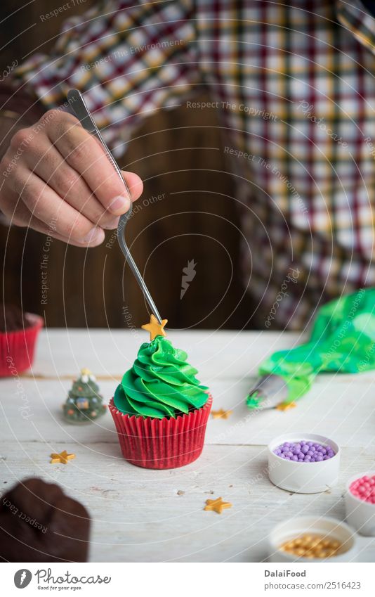 Making cupcake for christmas time Baking Cake Candy Feasts & Celebrations Christmas & Advent Cup Cupcake Decoration Dessert Festive Food Frost Gift Green Home