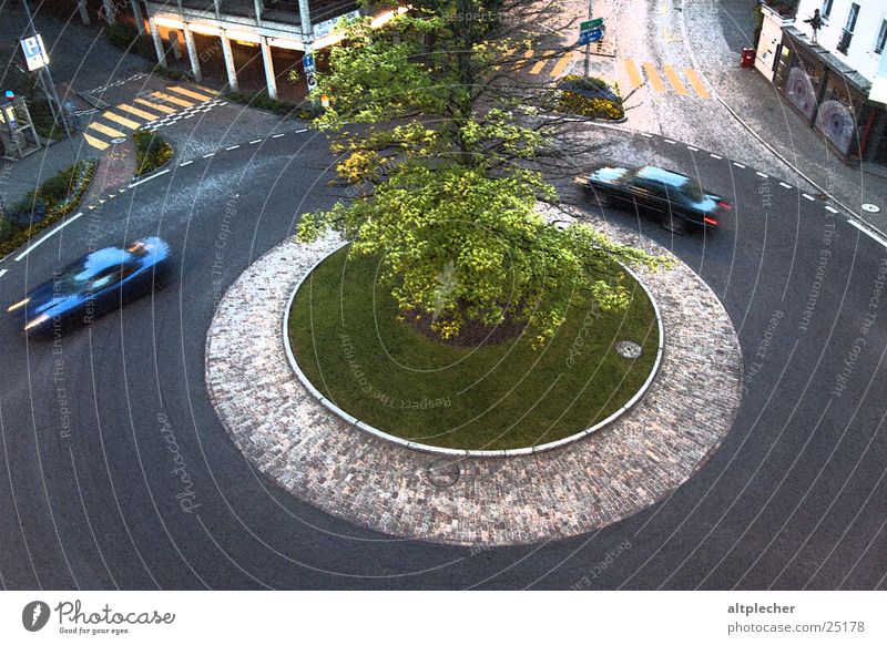 Swiss roundabout Transport Blur Zebra crossing Asphalt Twilight Circle Car Island Movement Paving stone