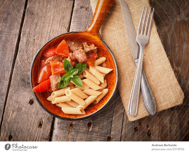 Organic beef goulash with wholemeal penne Meat Lunch Banquet Organic produce Winter Delicious Background picture dish hungarian soup Sauce rustic traditional