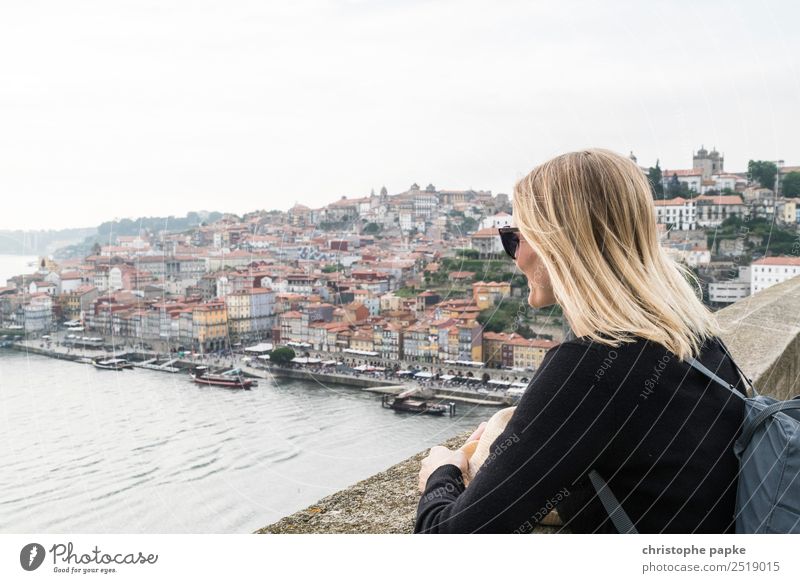 Woman looking at Porto's historic old town Tourism Far-off places City trip Young woman Youth (Young adults) 1 Human being 18 - 30 years Adults Portugal Europe