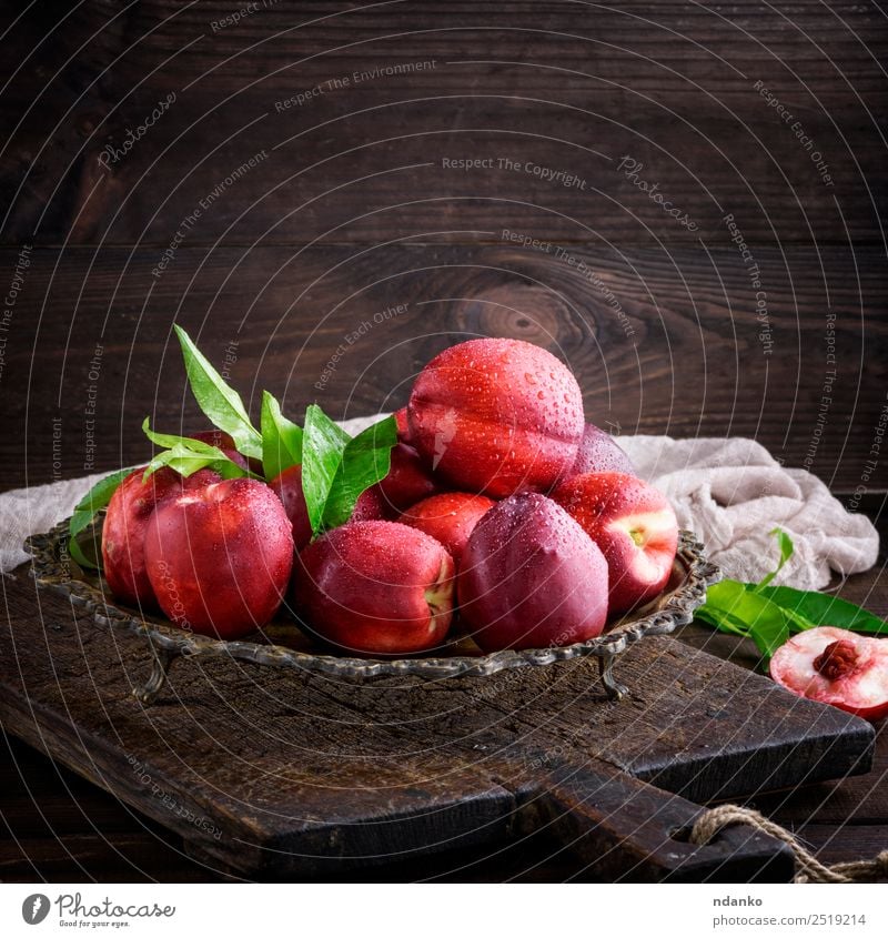red ripe peaches nectarine Fruit Dessert Nutrition Plate Bowl Summer Table Leaf Wood Fresh Above Juicy Brown Green Red Mature Peach Nectarine background food