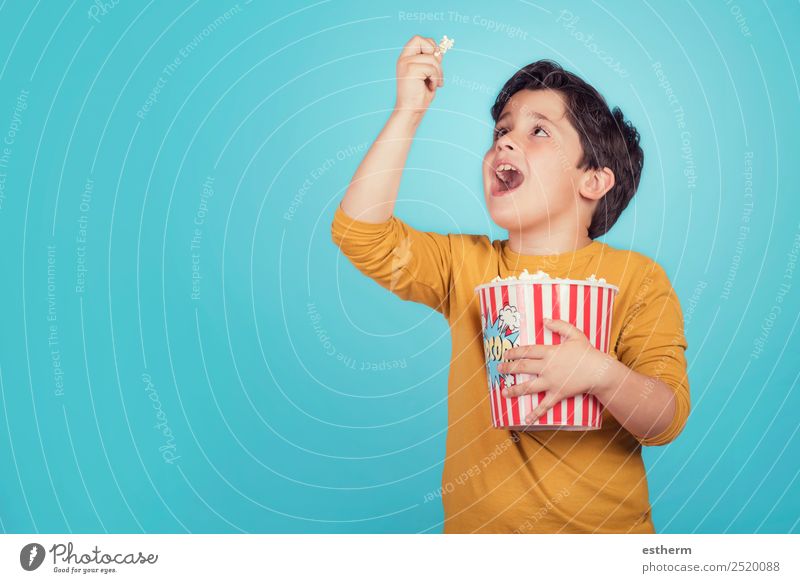 happy boy with popcorn Food Eating Fast food Lifestyle Joy Leisure and hobbies Entertainment Human being Masculine Child Boy (child) Infancy 1 8 - 13 years