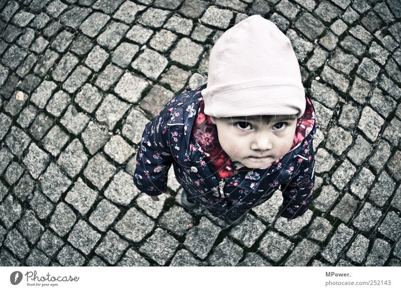 ...when I grow up... Child Girl Infancy Head 1 Human being 1 - 3 years Toddler Street Freeze Small Blue Pink Looking Eyes Cap Jacket Paving stone Looking up