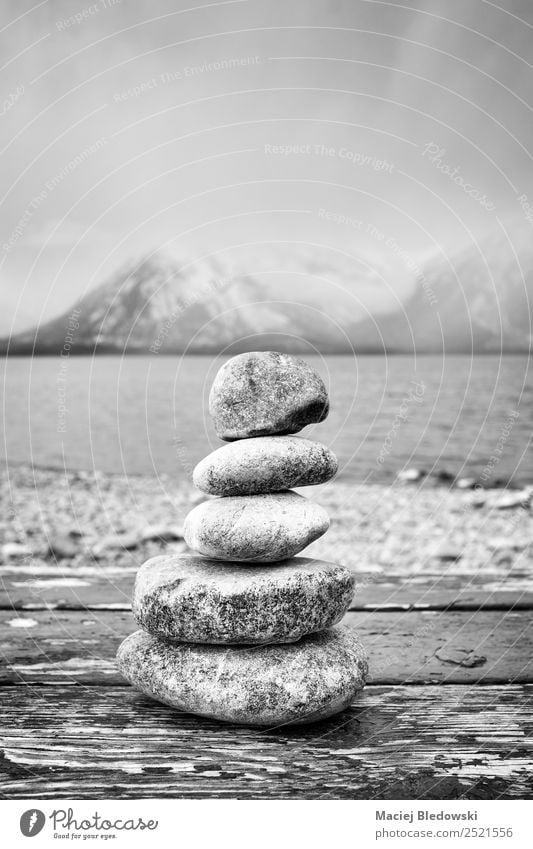 Black and white picture of balanced stones. Harmonious Trip Freedom Mountain Wallpaper Nature Clouds Fog Rock Lake Stone Leisure and hobbies Peace Mysterious