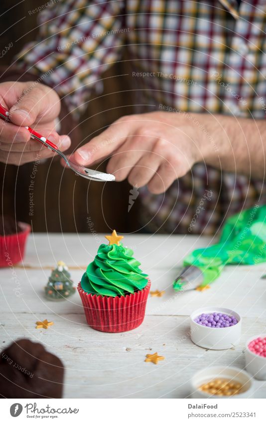 Making cupcake for Christmas time Baking Cake Candy Feasts & Celebrations Christmas & Advent Cup Cupcake Decoration Dessert Festive Food Frost Gift Green Home