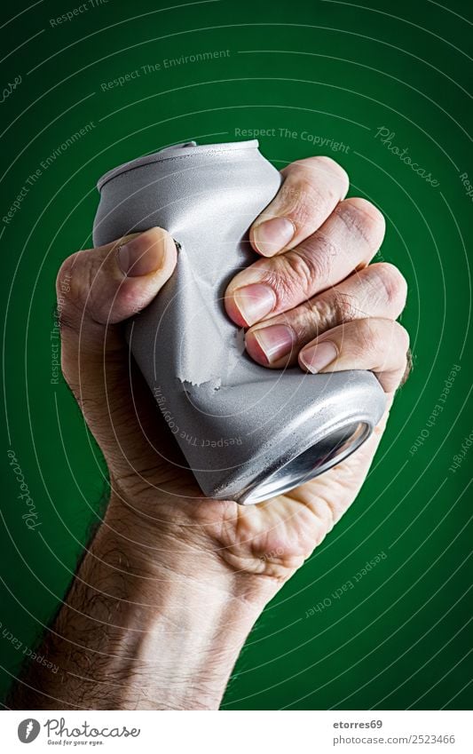 Man crushing a can Adults Hand 30 - 45 years Environment Climate change Metal Aggression Green Silver Crush Aluminium Container Environmental protection Tighten