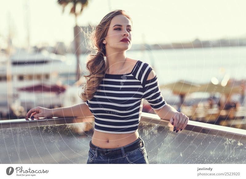 Blonde woman, model of fashion, standing in a harbor Lifestyle Happy Beautiful Hair and hairstyles Summer Human being Feminine Young woman Youth (Young adults)