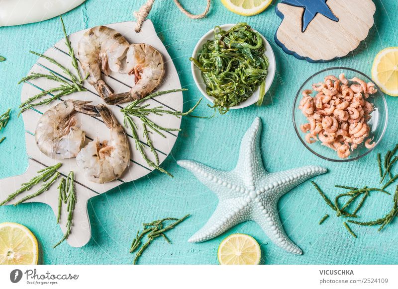 Shrimps and North Sea crabs on a light blue background Food Seafood Nutrition Vegetarian diet Diet Crockery Style Design Healthy Eating Table Restaurant Dish