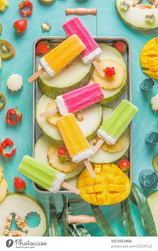 Fruit and ice cream on a stick Food Ice cream Nutrition Organic produce Vegetarian diet Crockery Shopping Style Design Summer Mango Kiwifruit Berries popsicles