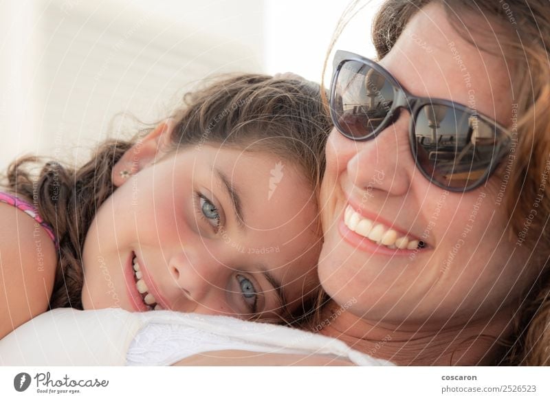 Mother and daughter smiling and hugging outdoors Joy Happy Beautiful Summer Mother's Day Child Human being Feminine Baby Toddler Girl Woman Adults Parents
