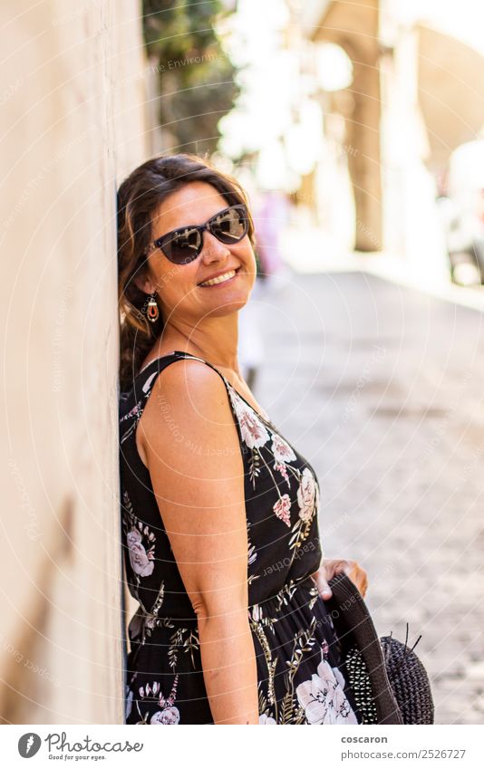 Middle aged woman on the street with a sunglasses Lifestyle Style Happy Beautiful Face Summer Camera Human being Feminine Woman Adults 1 30 - 45 years Street