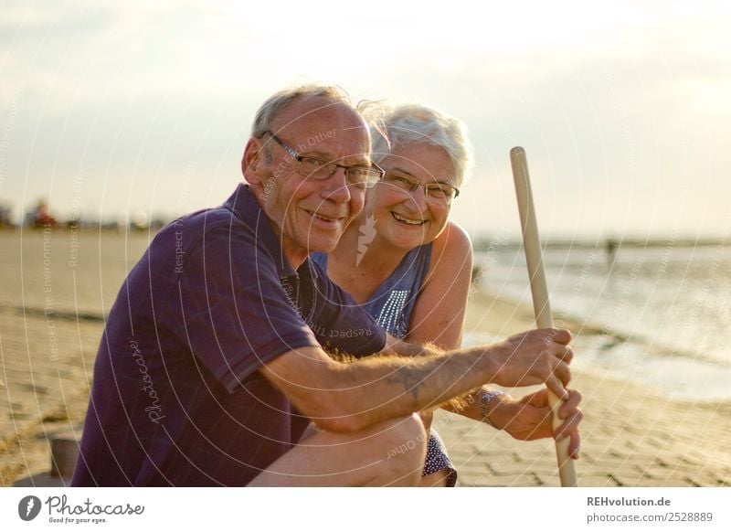 Laughing pensioner couple at the seaside Healthy Life Contentment Relaxation Calm Leisure and hobbies Vacation & Travel Summer Summer vacation Beach Ocean