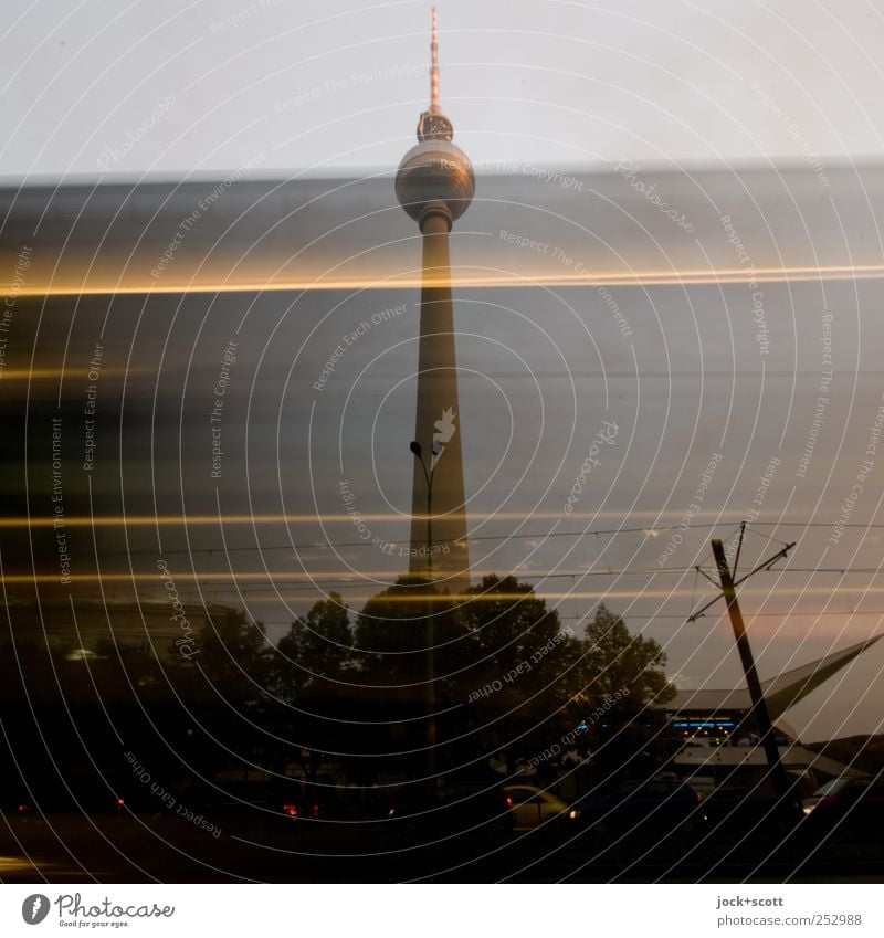 Tower - Sky - Dizziness Capital city Downtown Tourist Attraction Berlin TV Tower Means of transport Bus Driving Speed Mobility Dusk Antenna Strip of light