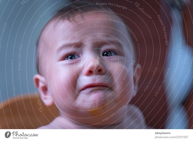 baby sitting sad and crying in the room Lifestyle Human being Face 1 0 - 12 months Baby Fear Colour photo