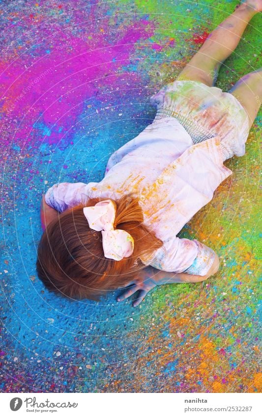 Little girl surrounded by colored paint dust Style Design Leisure and hobbies Children's game Education Kindergarten Human being Feminine Toddler Girl Infancy 1