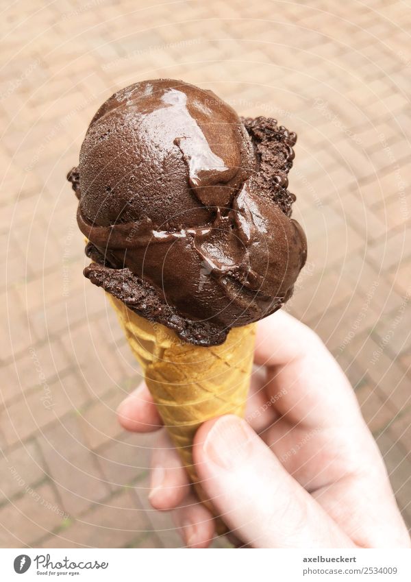 dark chocolate ice cream cone Food Dessert Ice cream Eating Lifestyle Summer Human being Man Adults Hand Authentic Hip & trendy Delicious Brown Hold Trend