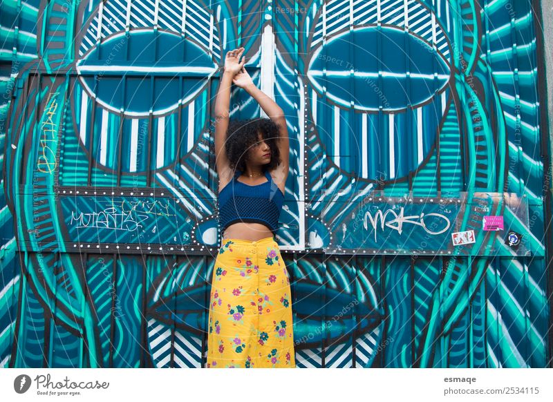 Portrait of Young woman with graffiti Lifestyle Beautiful Vacation & Travel Adventure Freedom Human being Youth (Young adults) Culture Youth culture Subculture