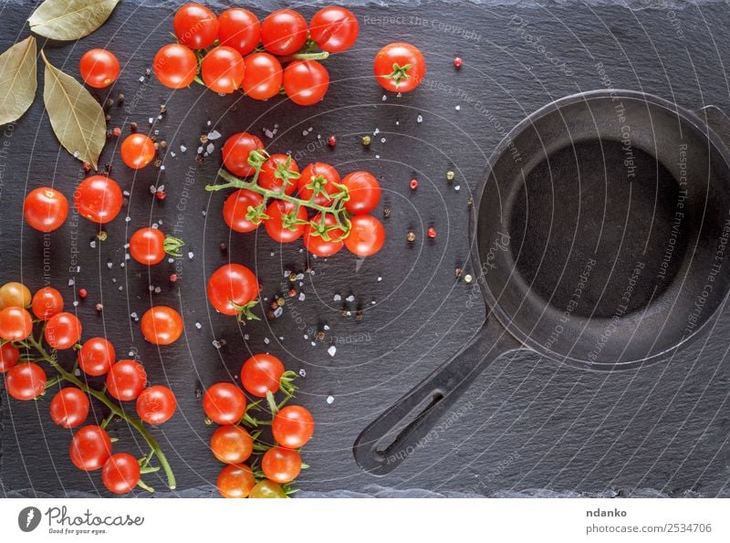 pan and fresh red ripe cherry tomatoes Vegetable Nutrition Lunch Vegetarian diet Pan Table Kitchen Eating Fresh Small Natural Above Green Red Black board branch