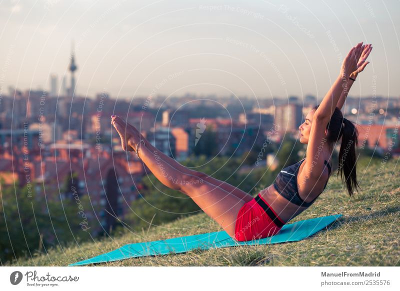 athletic woman working out on a mat in the park Lifestyle Beautiful Health care Wellness Sports Woman Adults Park Fitness Athletic Esthetic Contentment